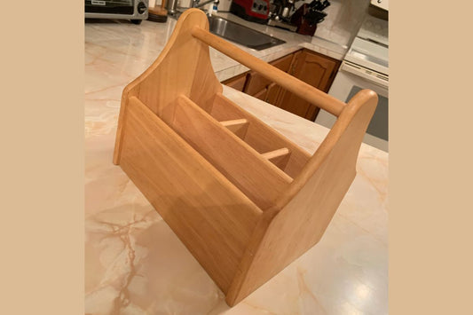 Thrift store wooden tool caddy before its DIY makeover